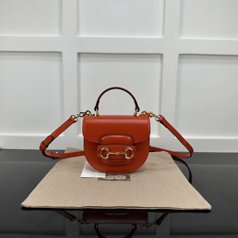 G*u*i top handle bags